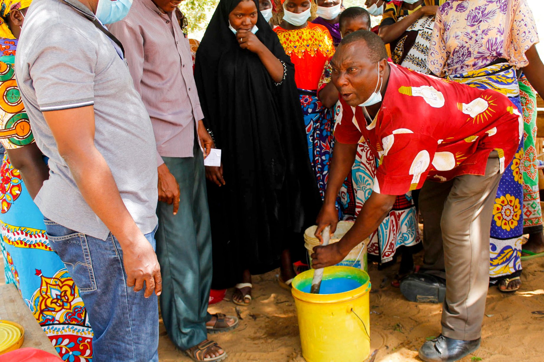 Kyangangu showing the community how to make soap